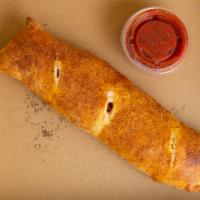 Large Stromboli · Large Stromboli is served wrapped in dough made daily at our shop.  Large Stromboli is serve...