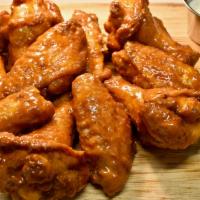40Ct. Bone- In Wings · Our all Natural Oven Baked wings served in your favorite sauce. No forks. No napkins. Simply...