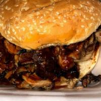 Pulled Pork Sandwich · Smoked hand crafted pulled pork seasoned to perfection will melt in your mouth served on hoa...