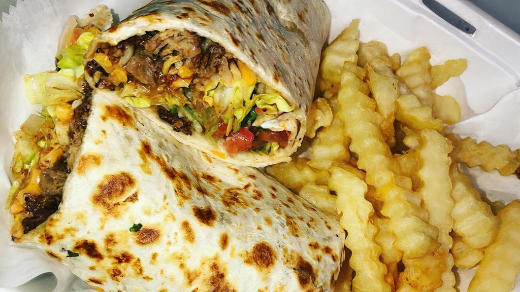 Steak Wrap · Grilled steak wrap with your choice of sauce topped with lettuce, cheese and pico de gallo.