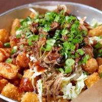 Loaded Tots · Tater Tots loaded with Creamy Coleslaw, Original BBQ Sauce, and Green Onions.