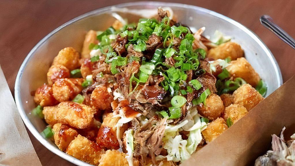 Loaded Tots · Tater Tots loaded with Creamy Coleslaw, Original BBQ Sauce, and Green Onions.