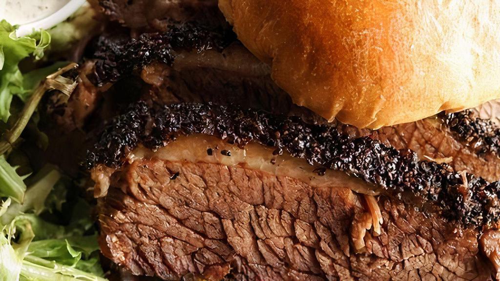Sliced Brisket Sandwich · Sliced Brisket Sandwich with your choice of a Side.