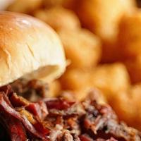 Chopped Brisket Sandwich · Chopped Brisket Sandwich with your choice of a Side.