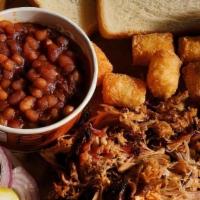 Pulled Pork Plate · Our House Smoked Pulled Pork Plate is Served with Your Choice of Two Sides, Pickles, Red Oni...
