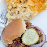 Family Meal Feeds 3-6 · Our Feast Family Meal feeds 3-6 and includes 1.5# of Our House Smoked Pulled Pork, Chopped C...