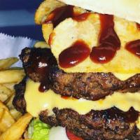 Yes Lawd Double Cheeseburger · Two 8 oz. homemade ground chuck patties grilled to order. Dressed with cheese. Served on a t...