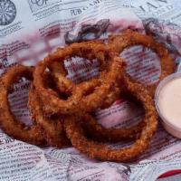 Onion Rings · HOUSE MADE WITH OUR SECRET BEER BATTER AND BREADING RECIPE, SERVED . WITH OUR COMEBACK SAUCE...