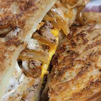 Patty Melt · Angus Burger Grilled and Seasoned, American, Swiss, & Gruyere Cheese  . Smothered with Grill...