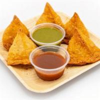 Vegetable Samosas (5 Pc) · Deep fried patties stuffed with fresh potatoes, green peas and freshly ground Indian spices ...