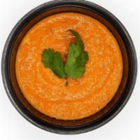 Tomato Chutney · Traditional South Indian condiment made by blending cooked tomatoes with chillies, cumin, gi...