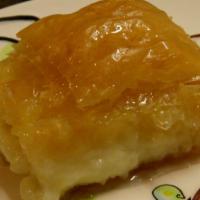 Homemade Galaktompoureko · Buttery phyllo layers filled with a farina orange-zest custard (upon availability).