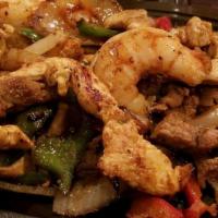 Lunch Fajitas · Gluten free. A sizzling skillet with a lunch sized portion of your choice of grilled chicken...