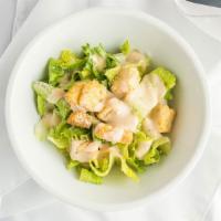 Caesar Salad · Gluten-friendly available. romaine lettuce, cucumbers, croutons, parmesan, house caesar dres...