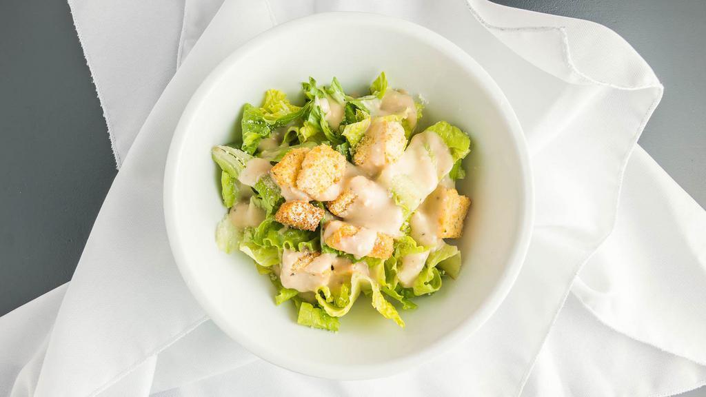 Caesar Salad · Gluten-friendly available. romaine lettuce, cucumbers, croutons, parmesan, house caesar dressing.