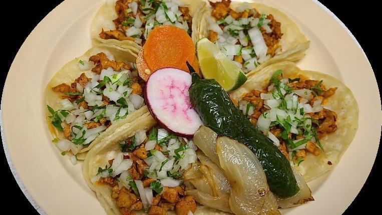 Tacos · corn tortilla, meat, onions, cilantro