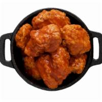 Boneless Chicken Wings · Sauces comes on the side with two ounce cups.