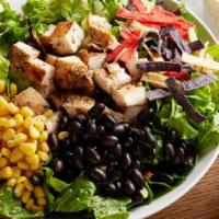 Southwest Chicken Salad · Herb-roasted chicken breast, corn, black beans, corn tortilla strips, and fresh greens. Serv...