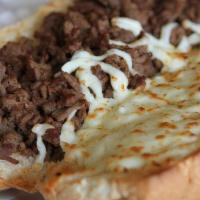 Philly Cheese Steak Sub · Thinly sliced steak, onions and green peppers, mozzarella, and mayo. Made with oven toasted ...