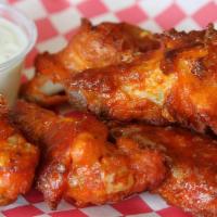 Oven Baked Wings · Spicy. Delicious buffalo wings, comes with ranch or blue cheese dressings!