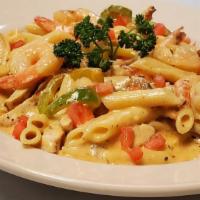 Penne Pasta · A parkway customer favorite! Penne pasta baked in a pink creamy sauce with ham, green peas, ...
