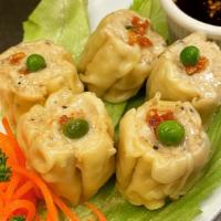 Steamed Dumpling  · Steamed Thai dumpling stuffed with ground chicken, shrimp, water chestnuts and shiitake mush...