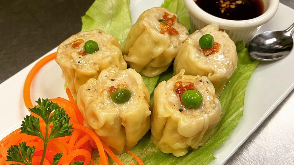 Steamed Dumpling  · Steamed Thai dumpling stuffed with ground chicken, shrimp, water chestnuts and shiitake mushroom served with Thai dumpling sauce.