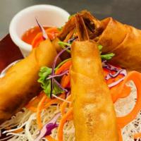 Shrimp Bikini · Crispy tiger shrimp wrapper in spring roll wrapper and stuffed with celery, carrot, and cabb...
