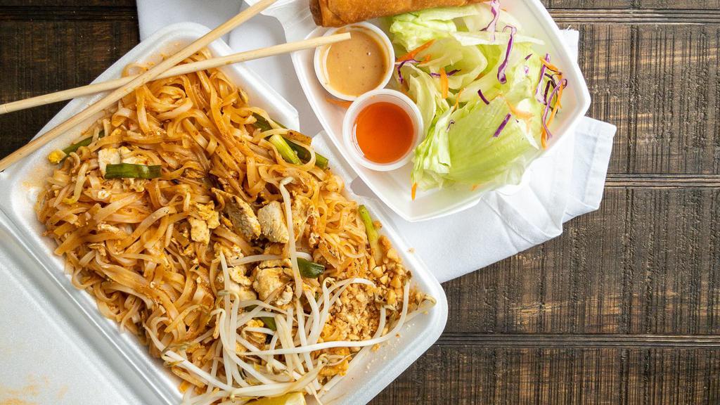 Pad Thai · A Thai dish, this stir fried thin rice noodle dish is made with your choice of meat, egg, and red bean curd and is served with bean sprouts, a slice of lemon and ground peanuts on the side.