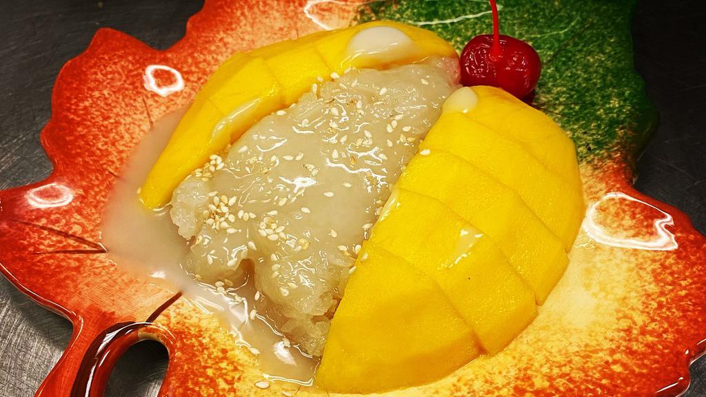 Fresh Mango And Sticky Rice · Sweet mango served with steamed sticky rice drizzled with coconut milk and lightly sprinkled with sesame seed.