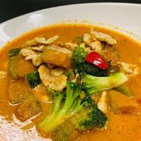Pumpkin Curry · An exotic green pumpkin combination with Thai red curry and your choice of meat.