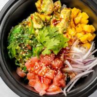 Tuna Poke · Tuna, seaweed salad, red onion, mango, avocado, goma and poke sauce. No substitutions.