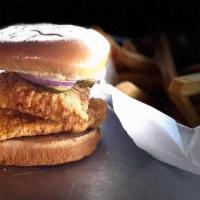 Fish Sandwich · Seasoned to perfection, Battered and fried fish filet topped with house made tartar sauce, h...