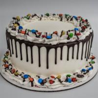 Cake- Vanilla Ice Cream, Chocolate Cake · Chocolate cake with vanilla ice cream with fudge filling. Chocolate drizzle decoration. 8 in...