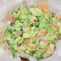 Table Side Mexican Guacamole · Fresh guacamole prepared with fresh lime juice, red onions, cilantro, tomatoes, jalapeños, a...