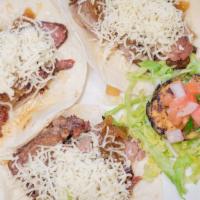 El Taco Loco Burrito · One grande burrito stuffed with your choice of grilled chicken, steak or mixed, pico de gall...