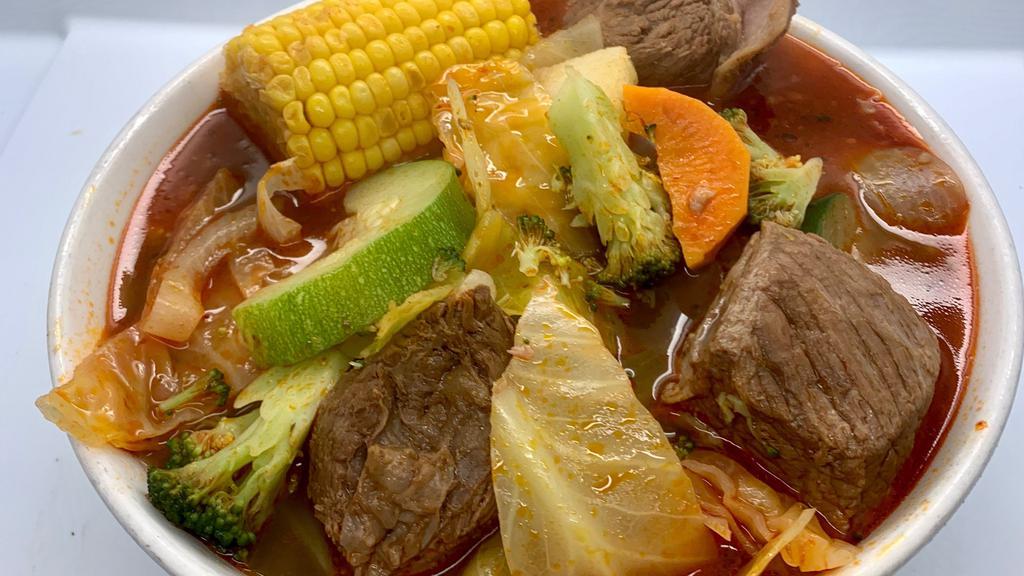 Caldo De Res · Jalapenos, onions, tomato, broccoli, cabbage, carrots, potatoes, and beef in a beef stew.