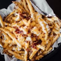 Dipstick Cheese Fries · Our potato fries are sliced fresh daily in our kitchen, fried to perfection, then smothered ...