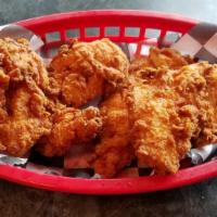 First Aid Chicken Tenders · All-white meat chicken tenders fried golden & served with dipping sauce.
