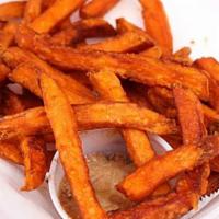 The Tip Off Sweet Potato Fries · This heaping basketful of sweet potato fries is sure to keep you coming back.