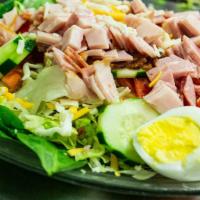 Chief “Chef” Salad · Fresh mixed greens, sliced turkey breast, deli ham, boiled egg, diced tomatoes, cucumbers, r...