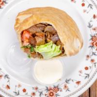 Gyros Sandwich · Sliced beef & lamb served with your choice of fresh lettuce, tomatoes, onions, cucumbers & d...