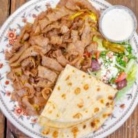 Gyro Platter · Beef & lamb over rice, with your choice of lettuce, tomatoes, onions, cucumbers or tabbouleh...
