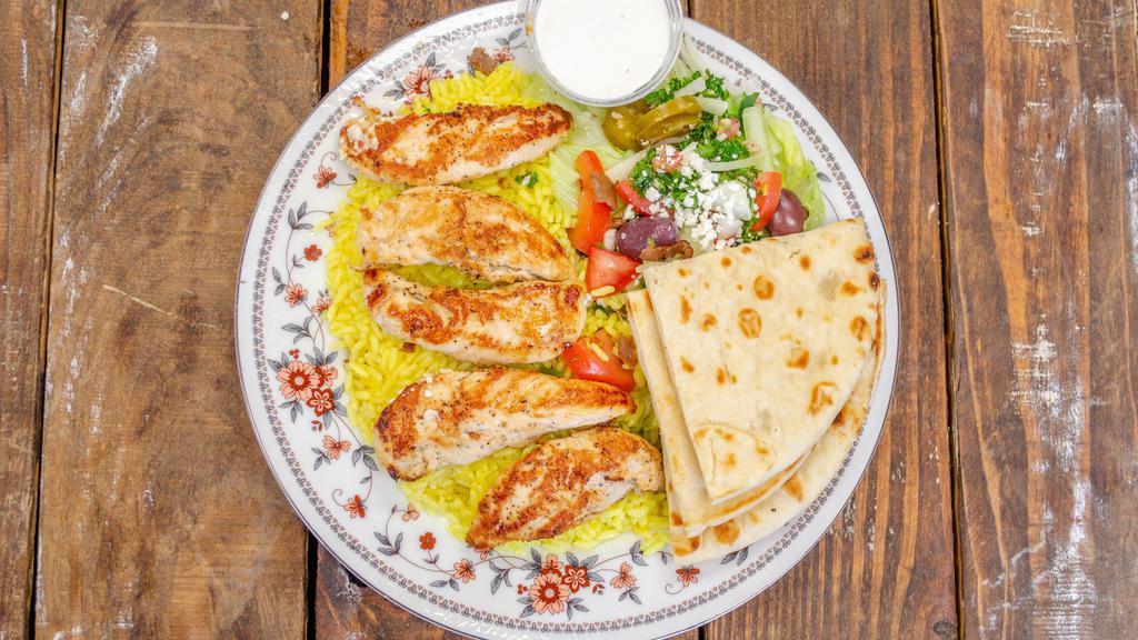 Chicken Platter · Grilled chicken served on top of rice, with your choice of lettuce, tomatoes, onions and cucumbers or tabbouleh salad, and pita bread. with ranch or cucumber dressing.