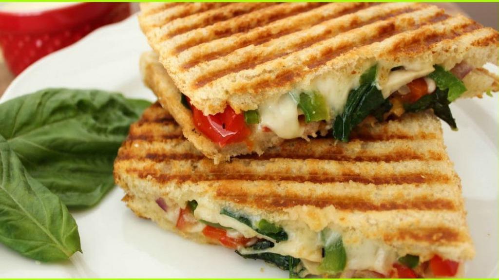 Meatless Panini · Fresh mozzarella cheese, plum tomato, basil spinach, sun dried tomato, Romaine lettuce, and pesto sauce.
Served with chips and pickle