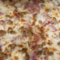 Medium Meat Lovers Pizza · Pizza sauce, mozzarella, regular, pepperoni, sausage, ham, bacon and meatball.