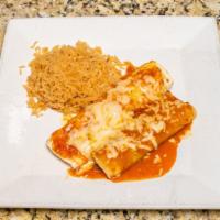 Burrito Espinaca · One flour tortilla stuffed with grilled chicken, rice, beans, and onions. Topped with a spin...