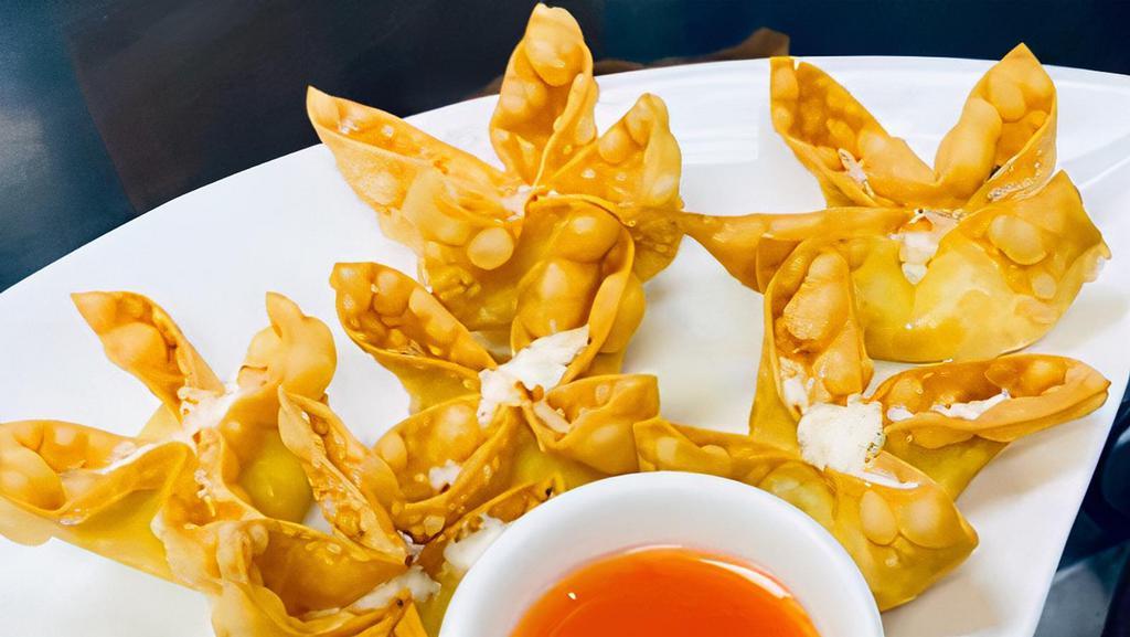 Crispy Crab Wonton · 6 pieces. Wontons stuffed with crab meat and cream cheese.