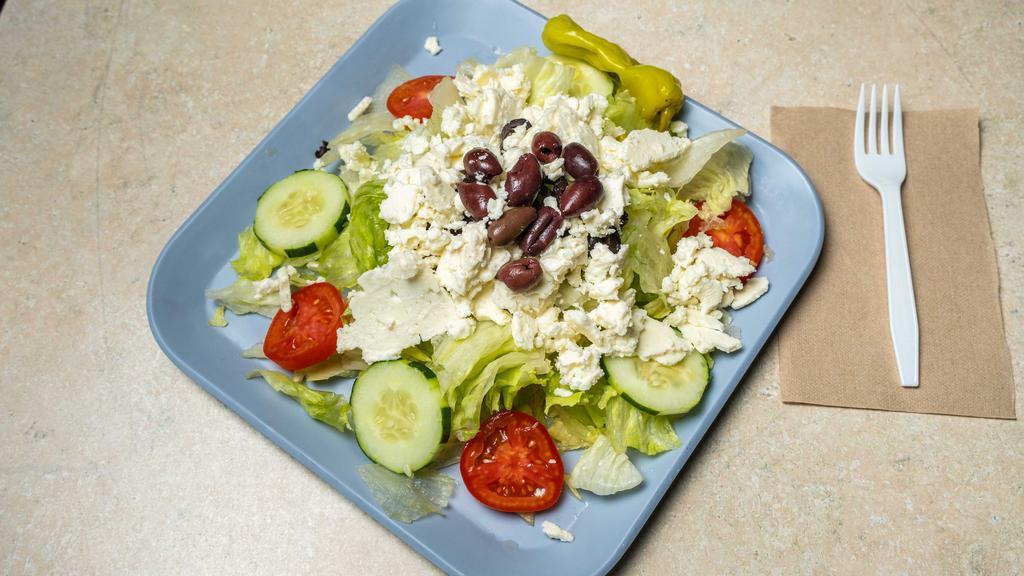 Mediterranean Salad
 · Crispy greens, grape tomatoes, cucumbers, feta cheese, onions, olives, green peppers, pepperoncini, and hard boiled egg.