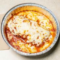 Lasagna With Meat
 · Lasagna topped with classic cheese, tomato sauce, and ground beef.